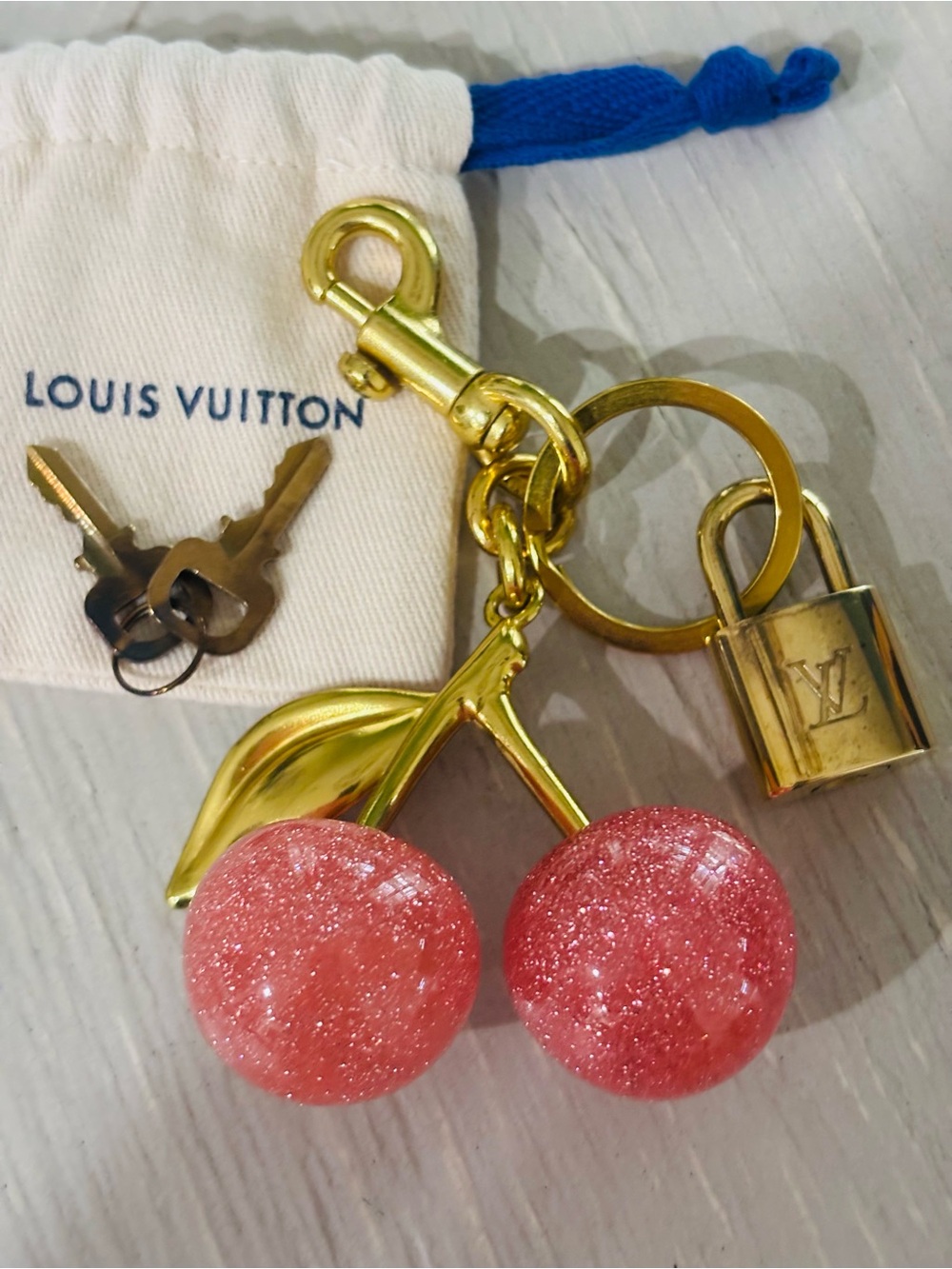 Authentic Louis Vuitton Lock & Key Set with Unbranded Cherry Bag Charm. 🌸